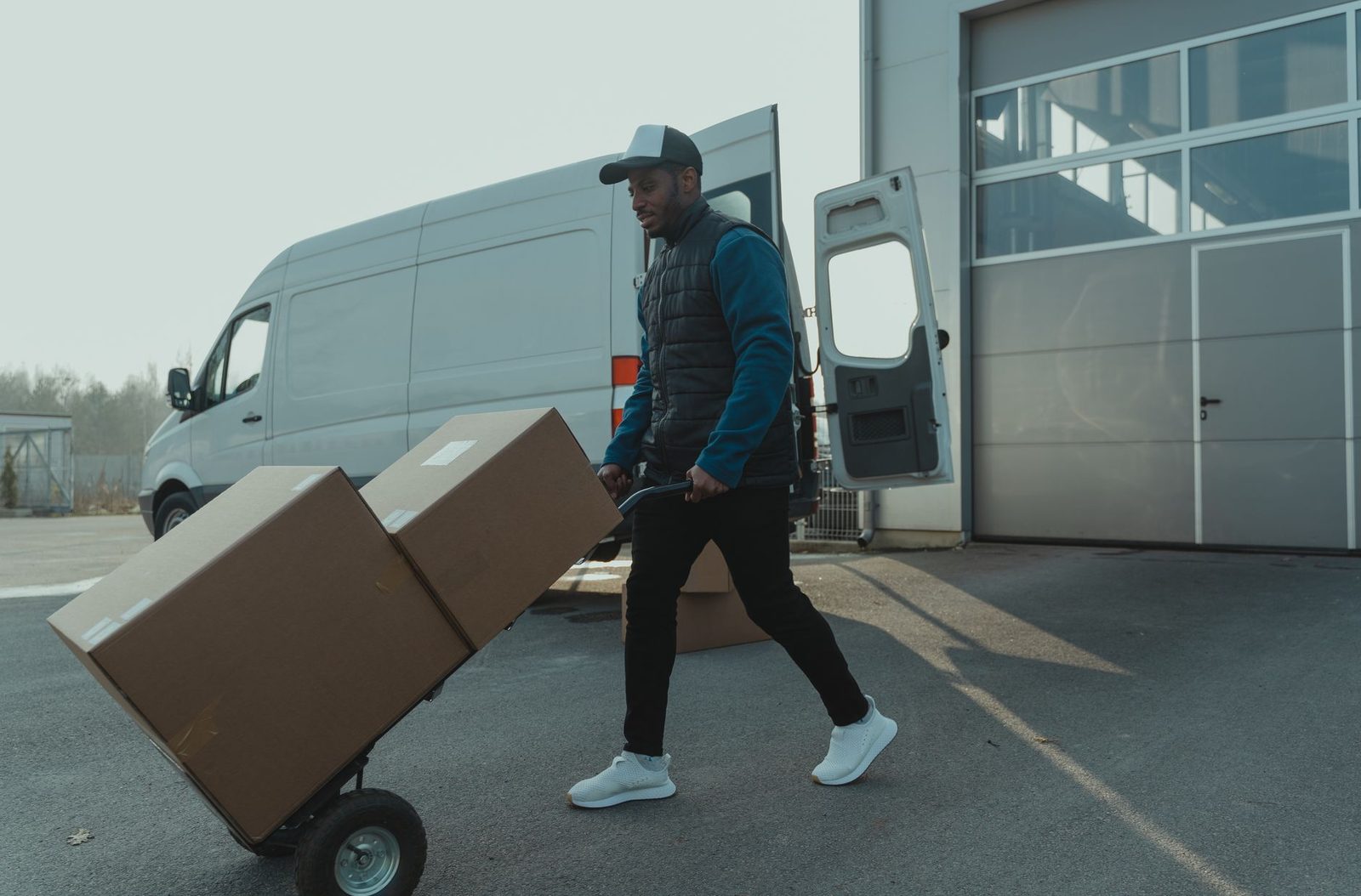 Junk removal crew loading household items into a truck